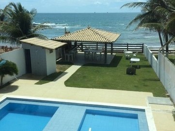 Aluguel por temporada de casa com 08 suítes à beira mar de Enseada dos Corais