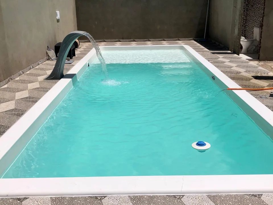 Aluguel Temporada: Casa Espaçosa com Piscina Pertinho da Praia